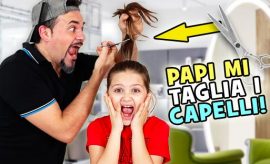 Papi taglia i capelli a Marta